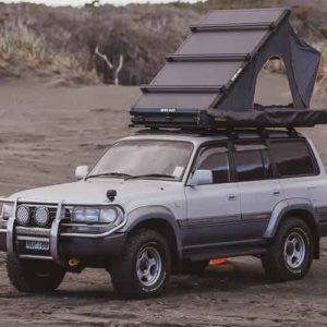 4x4 Land Cruiser with rooftop tent on camping safari in Rwanda
